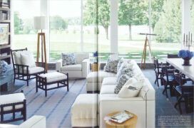 Magazine spread showing great room interior showing seating and view of Lake Geneva