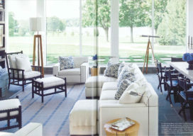 Magazine spread showing great room interior showing seating and view of Lake Geneva