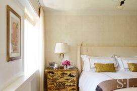 Fifth Avenue Pied-à-Terre bedroom in neutral tones with custom bedside table