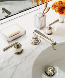 Detail of bathroom sink with hardware in Nickel from Waterworks and polished Statuary