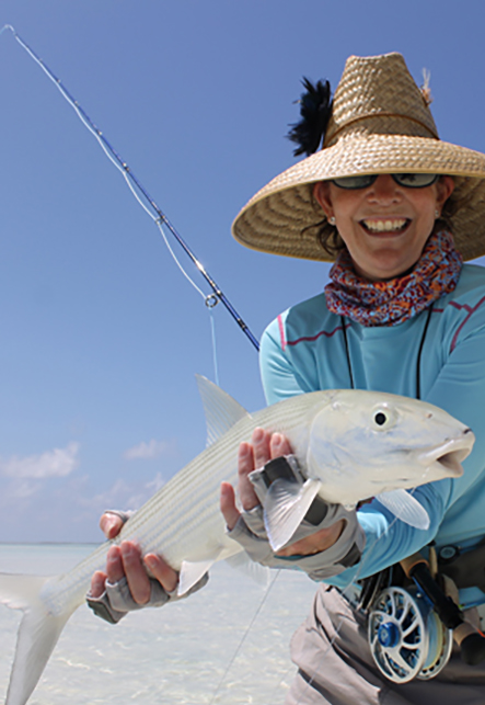 Suzanne Lovell while fly-fishing on vacation