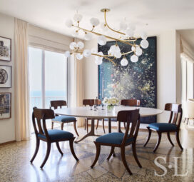 Dining Room interior with artworks by Ori Gersht and Ray Johnson and custom chandelier by Jeff Zimmerman