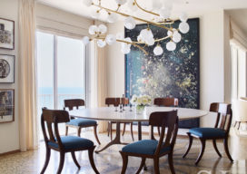 Dining Room interior with artworks by Ori Gersht and Ray Johnson and custom chandelier by Jeff Zimmerman