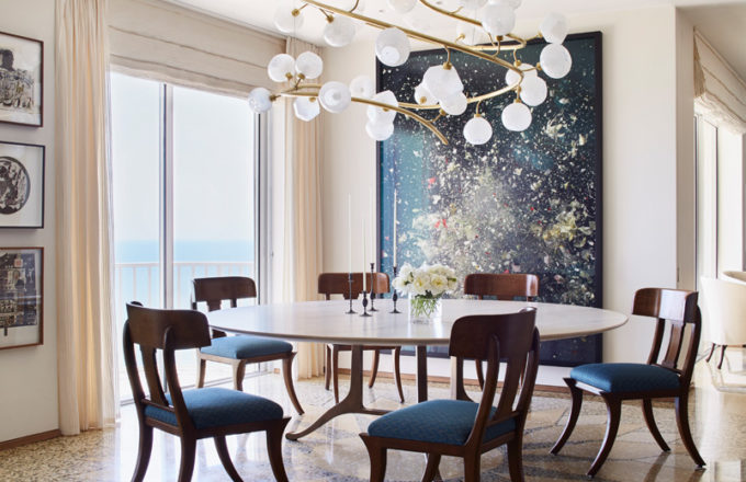 Dining Room interior with artworks by Ori Gersht and Ray Johnson and custom chandelier by Jeff Zimmerman