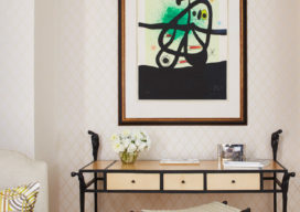 Sitting room detail showing artwork by Joan Miró above a desk and seat by Ingrid Donat