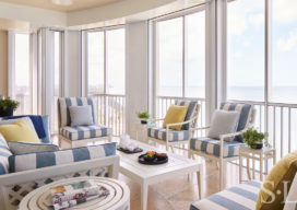 Terrace with Gulf Coast views and furniture by McKinnon and Harris upholstered in striped outdoor fabric by Perennials