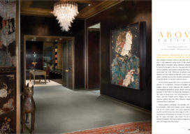 Interiors Magazine spread featuring Chicago skyline penthouse spacious entry gallery with cashew lacquered plaster walls and artwork by Manolo Valdés