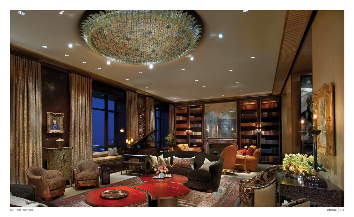Interiors Magazine spread featuring great room of Chicago skyline penthouse designed by Suzanne Lovell Inc. with monumental chandelier by Flavio Poli