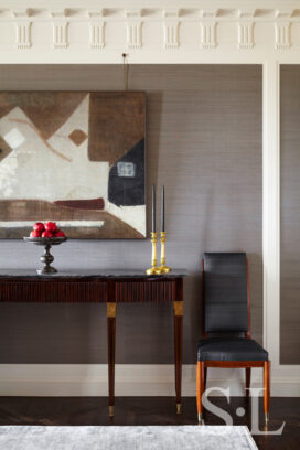 Dining room detail featuring a Buffa sideboard and a painting by Kenzo Okada