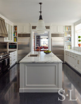 Custom chef’s kitchen view towards family room