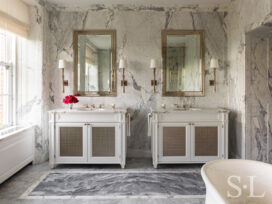 Master bath detail featuring custom designed vanities