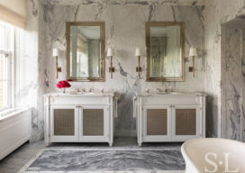 Master bath detail featuring custom designed vanities