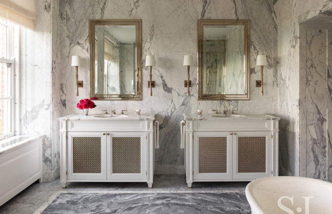 Master bath detail featuring custom designed vanities