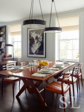 Breakfast room featuring an original table by Le Corbusier and Pierre Jeanneret and mid-century modern chairs