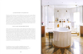 Book spread showing primary bathroom in Naples, FL penthouse with terrazzo flooring, a sculptural tub, and a large shower with glass doors