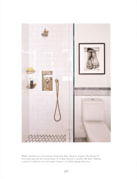 Book spread showing water closet and shower in white and grey designed by Suzanne Lovell Inc.