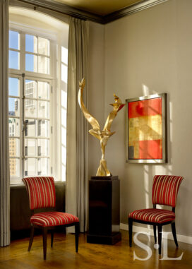 Deco-era duplex apartment corner detail with a bronze sculpture by Richard Hunt