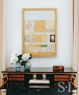 Deco-era duplex apartment bedroom detail showing a c. 1810 Empire writing commode with artwork above