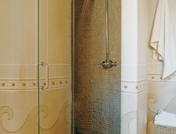 Deco-era duplex apartment bathroom walk-in shower with curved walls and decorative painting
