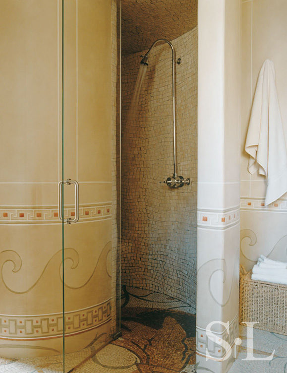 Deco-era duplex apartment bathroom walk-in shower with curved walls and decorative painting