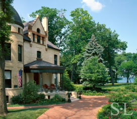 Front exterior view of restored landmark residence on former military base in Chicago’s North Shore overlooking Lake Michigan