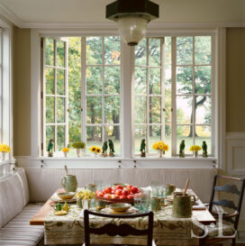 Restored landmark residence on former military base sun porch breakfast room with Lake Michigan view