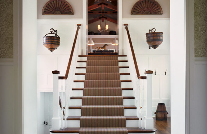 Restored landmark residence on former military base staircase leading to great room with antique Chinese well buckets