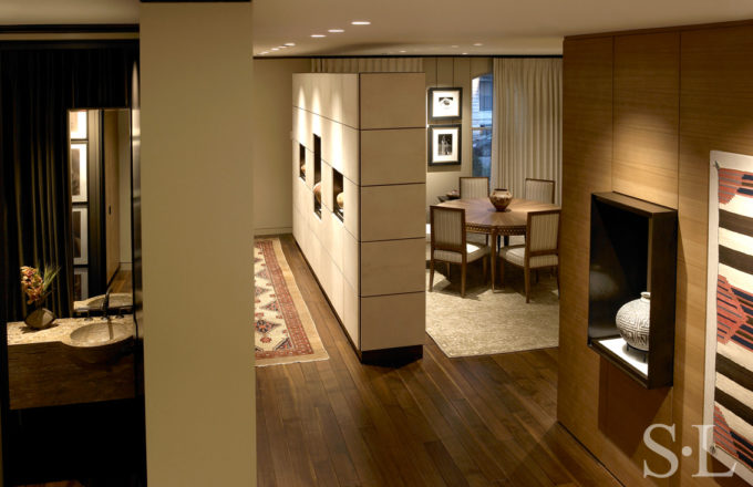 Lincoln Park Chicago landmark residence view to foyer and dining room with display cabinet made of goatskin panels