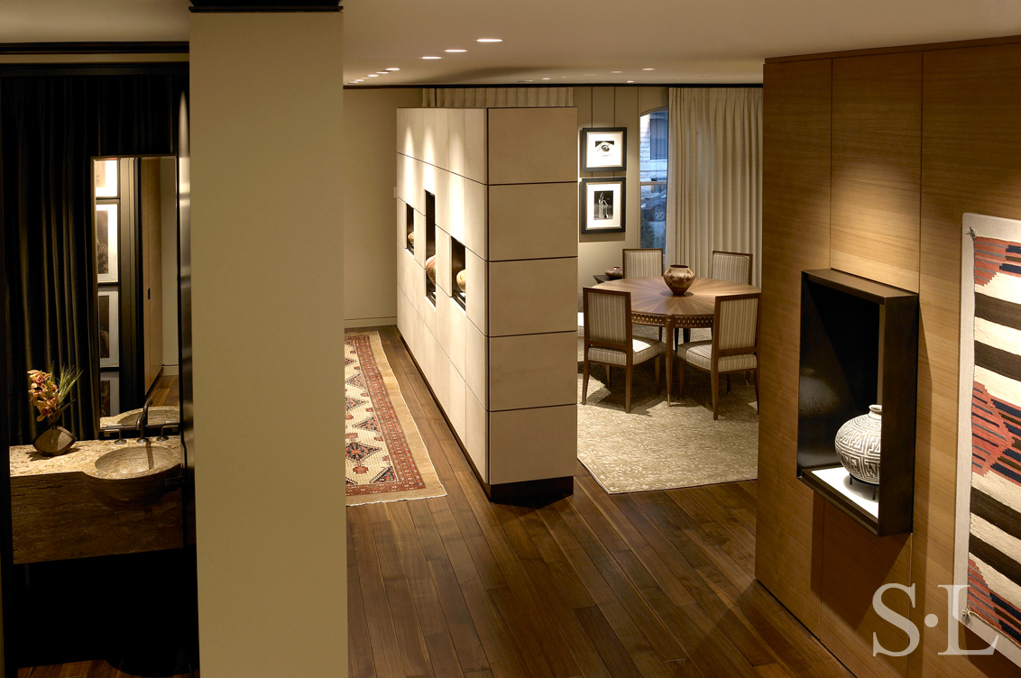 Lincoln Park Chicago landmark residence view to foyer and dining room with display cabinet made of goatskin panels
