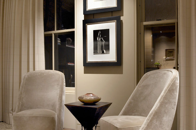 Lincoln Park Chicago landmark residence seating area with a Gene Summers bronze table and a pair of photographs by André Kertész