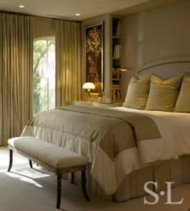 Lincoln Park Chicago landmark residence primary bedroom in neutral colors with artwork by Andrea Wasserman and view towards window