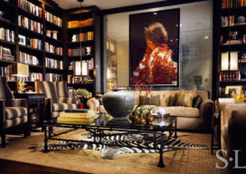 Chicago townhome library with Chanel sofa and artwork by Vik Muniz