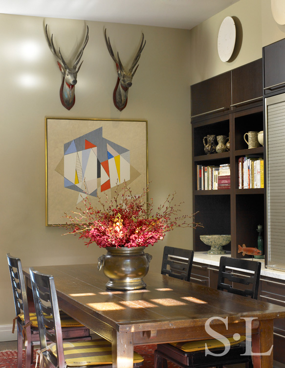 Chicago townhome dining area with artwork by Herbert Bayer