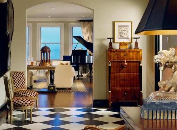 1920s era Lake Shore Drive penthouse entrance hall with black and white checkerboard floor