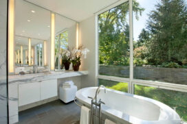 Lake House bathroom view towards vanity and view out large windows