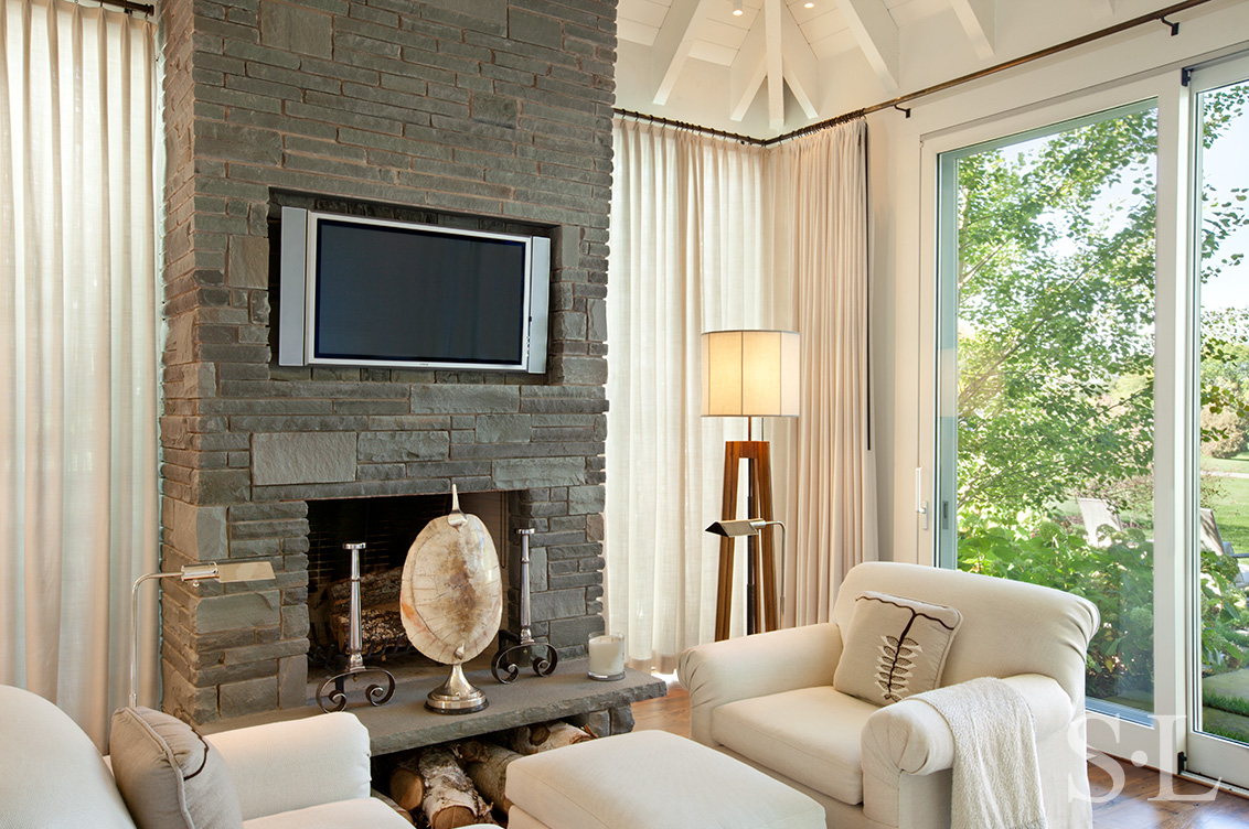 Master bedroom view of fireplace and seating area