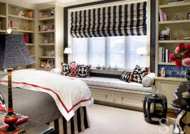 Girl's bedroom with black and white striped window coverings