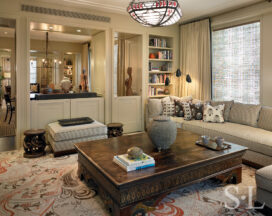 Chicago high-rise apartment family room with coffee table design based on antique Tibetan bed