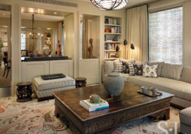 Chicago high-rise apartment family room with coffee table design based on antique Tibetan bed