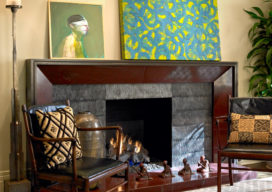 Chicago high-rise apartment living room detail showing fireplace and artwork by Joby Baker and Bill Zima
