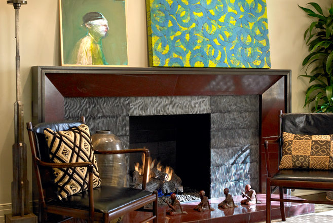 Chicago high-rise apartment living room detail showing fireplace and artwork by Joby Baker and Bill Zima