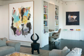 Manhattan residence interior view towards library and office with artwork by Gerog Baselitz and James Rosenquist and a Christian Astuguevieille rope-wrapped chair