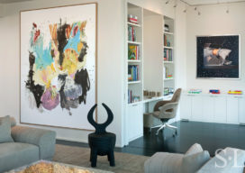 Manhattan residence interior view towards library and office with artwork by Gerog Baselitz and James Rosenquist and a Christian Astuguevieille rope-wrapped chair