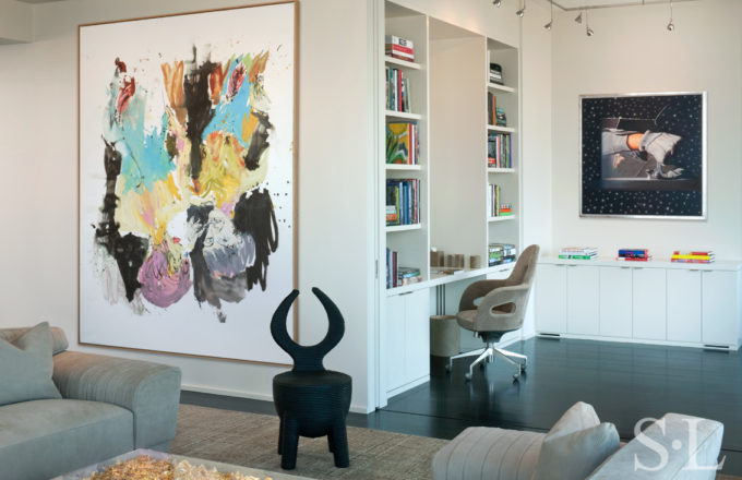 Manhattan residence interior view towards library and office with artwork by Gerog Baselitz and James Rosenquist and a Christian Astuguevieille rope-wrapped chair