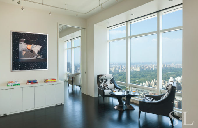 Manhattan residence seating area with black table by Wendell Castle and sweeping view of New York’s Central Park