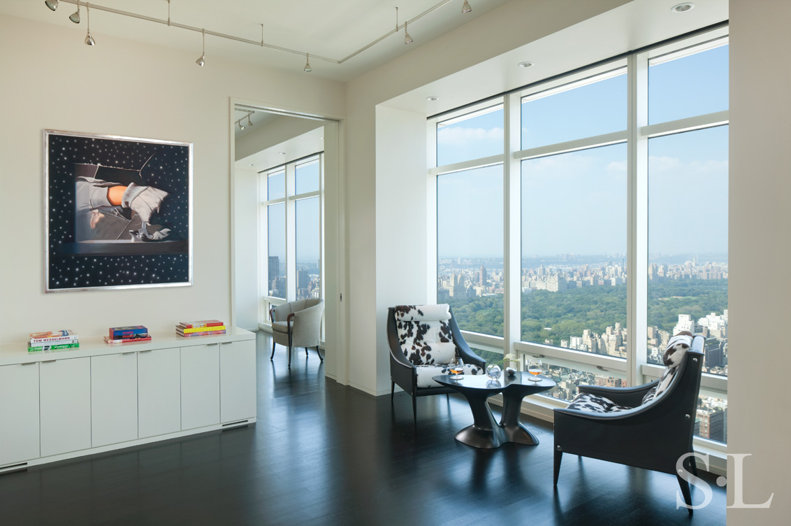 Manhattan residence seating area with black table by Wendell Castle and sweeping view of New York’s Central Park