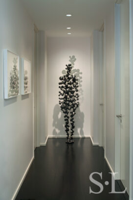 Manhattan residence hallway with artwork by Antony Gormley