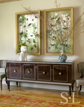 Dining room detail featuring sideboard by Frank Pollaro and Jeff Koons ceramic puppy