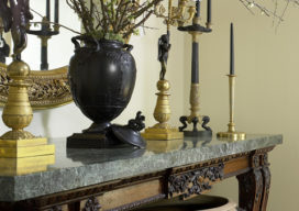 Entry detail featuring a rare Wedgwood vase atop a carved Italian console and ‘A Monumental Vessel’ by Per Weiss