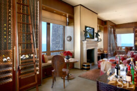 Chicago skyline penthouse kitchen seating area with fireplace